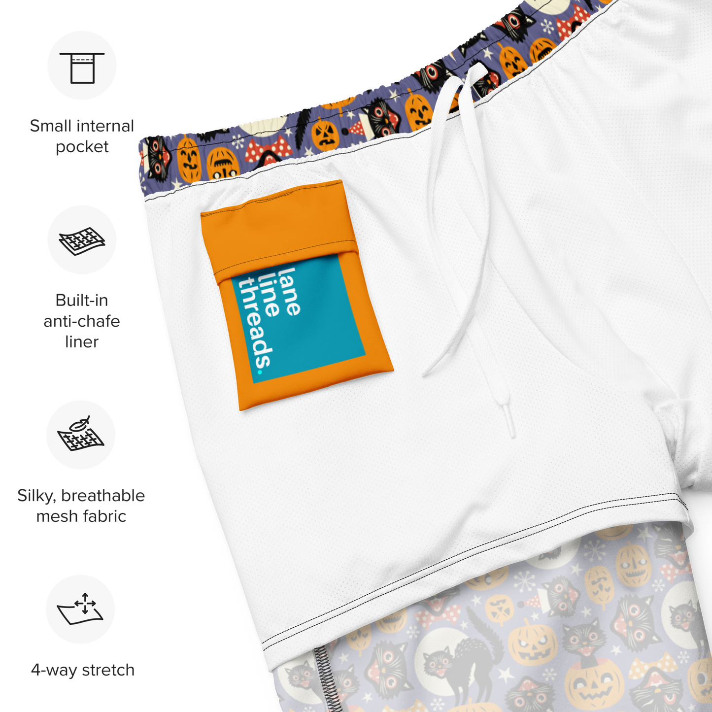 Recycled swim trunks with Halloween-themed waistband and pocket, featuring lane lines threads branding.