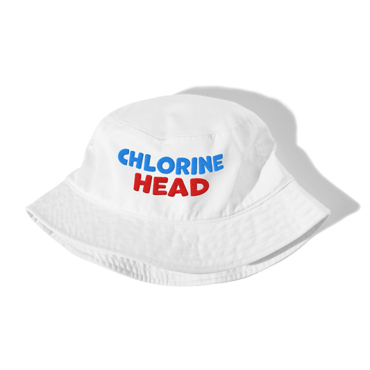 White bucket hat with 'CHLORINE HEAD' text in blue and red on a white background