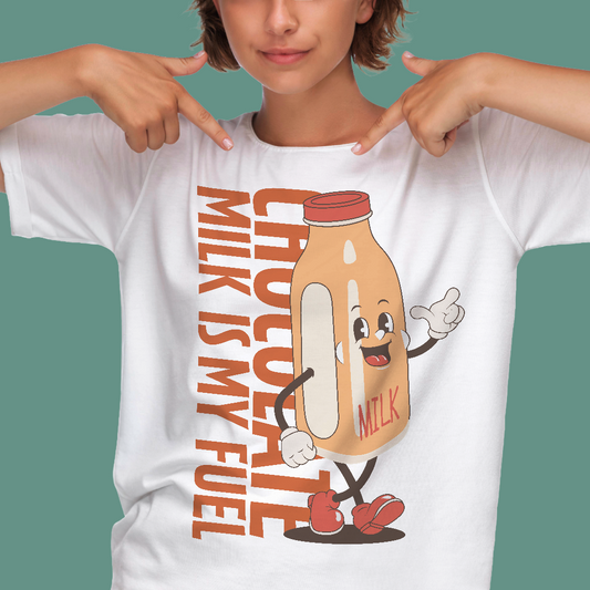 Person wearing a white organic swim shirt with a cartoon milk bottle character and text on a green background