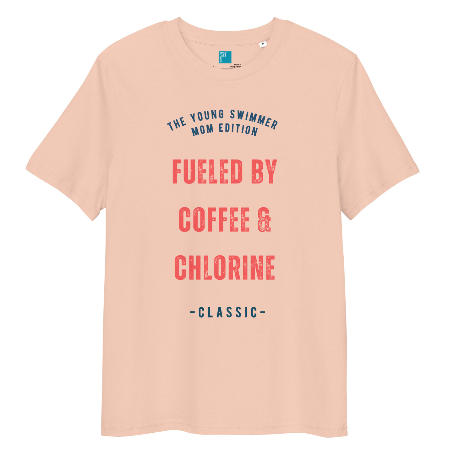 Fraiche peche organic cotton swim mom t-shirt with red and navy text: “Fueled by Coffee & Chlorine – The Young Swimmer Mom Edition – Classic.”