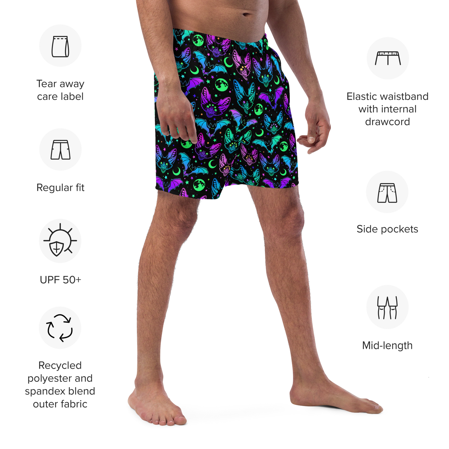 A person wearing Halloween themed organic swim trunks with product features listed on a white background