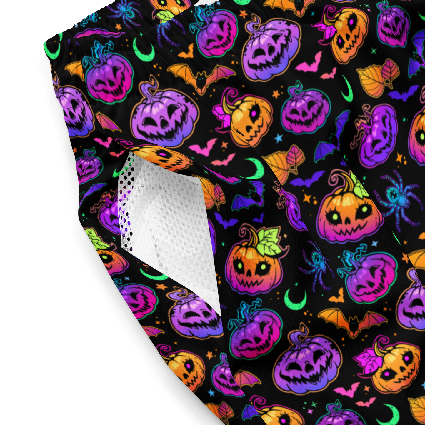 Halloween-themed organic swim trunks with colorful pumpkins and ghosts on a black background