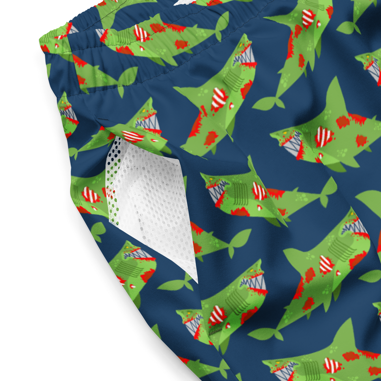Halloween organic swim trunks with zombie shark pattern on a blue background
