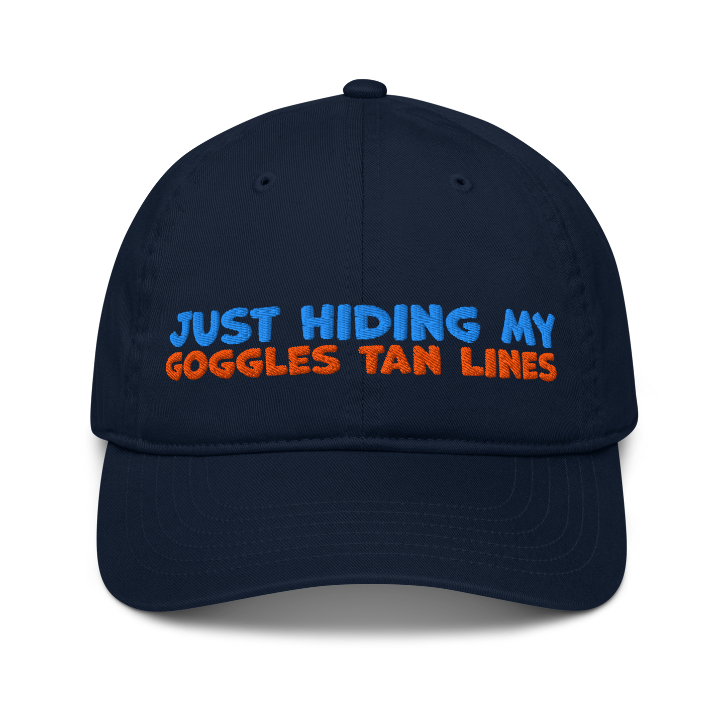 Navy blue organic cotton baseball cap for swimmers with "JUST HIDING MY GOGGLES TAN LINES" embroidered in blue and orange text.
