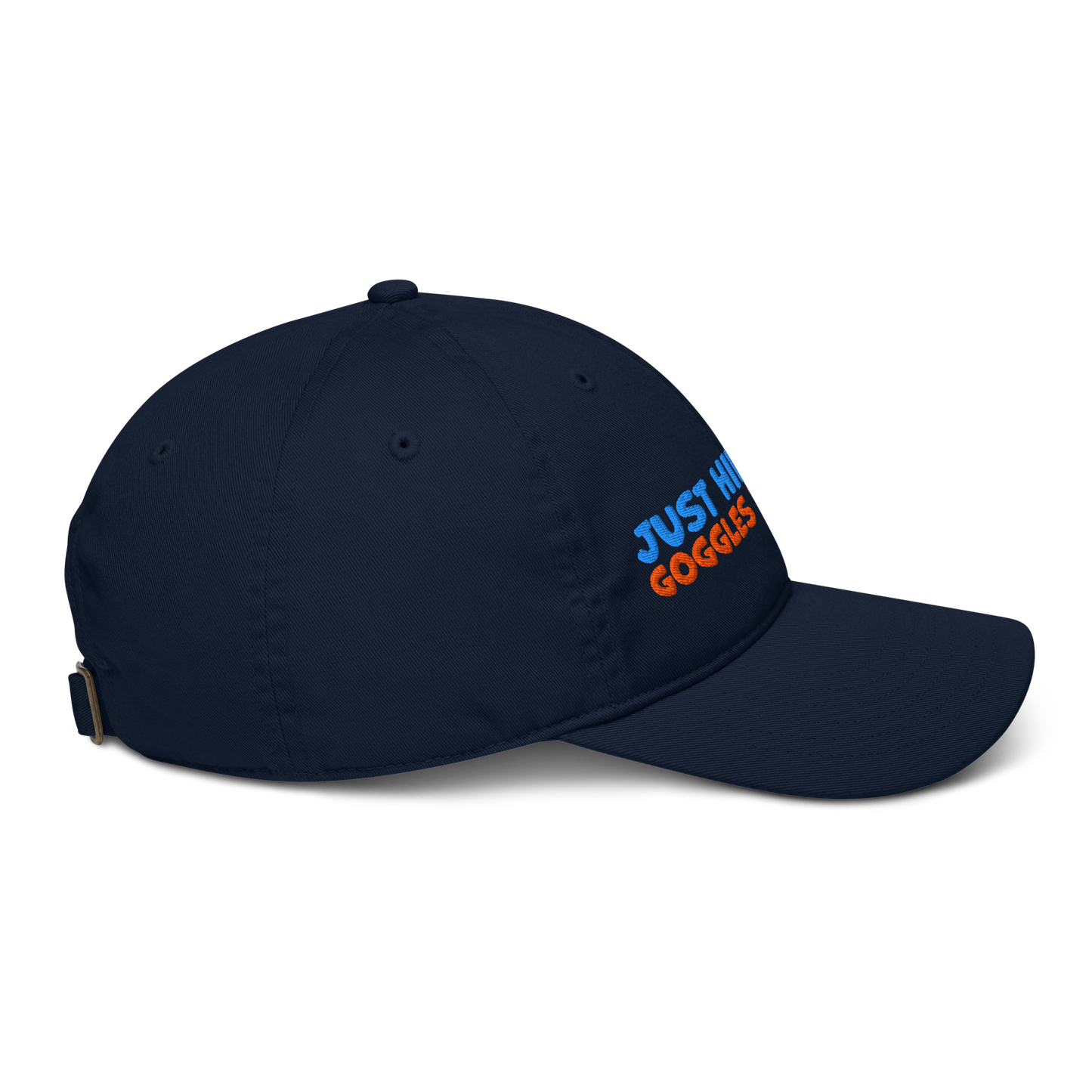 Navy blue cap with 'just hiding my goggles tan lines' text on a white background