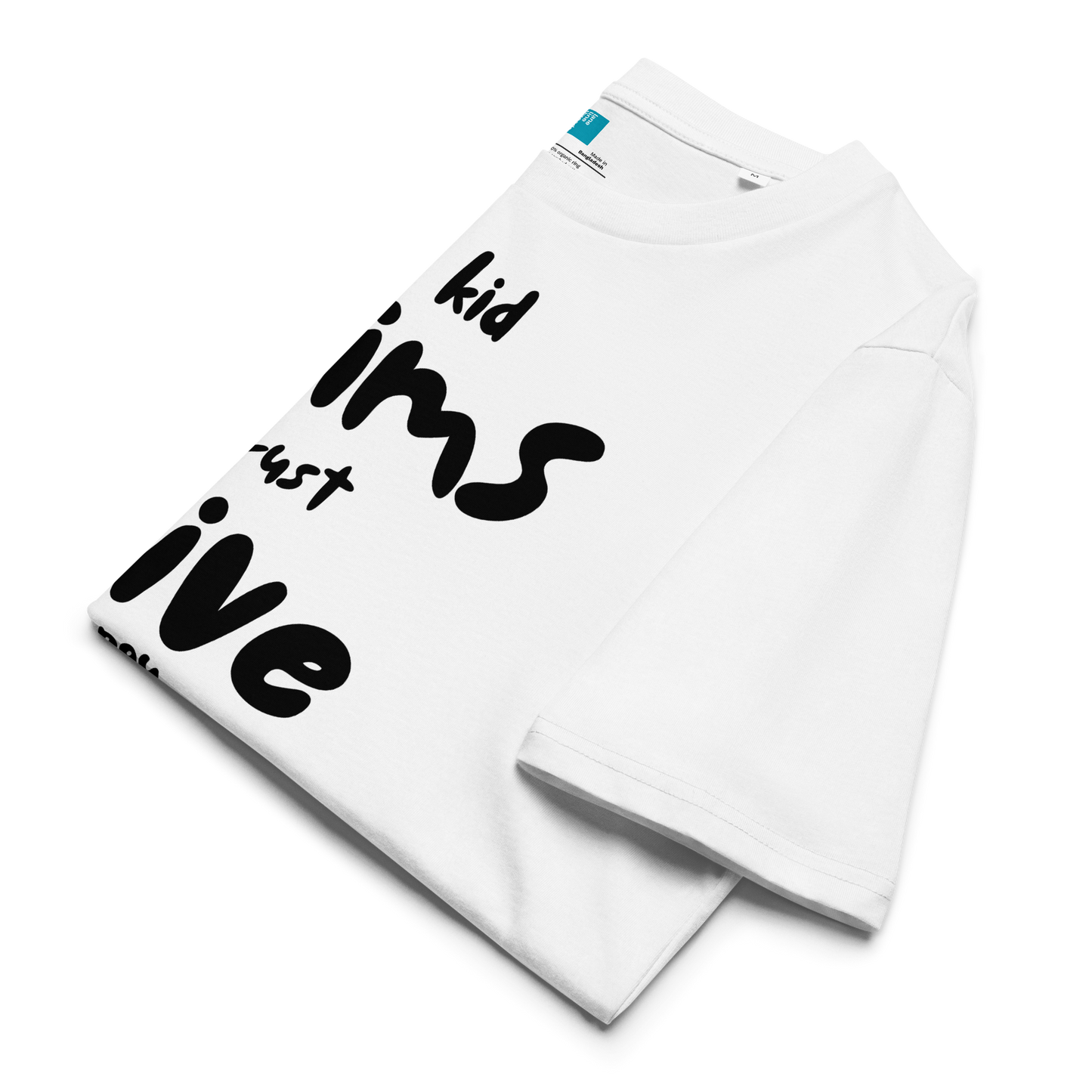 White folded organic cotton t-shirt with bold black playful text: “my kid swim, i just drive and pay for snacks,” perfect for swim moms with a sense of humor.