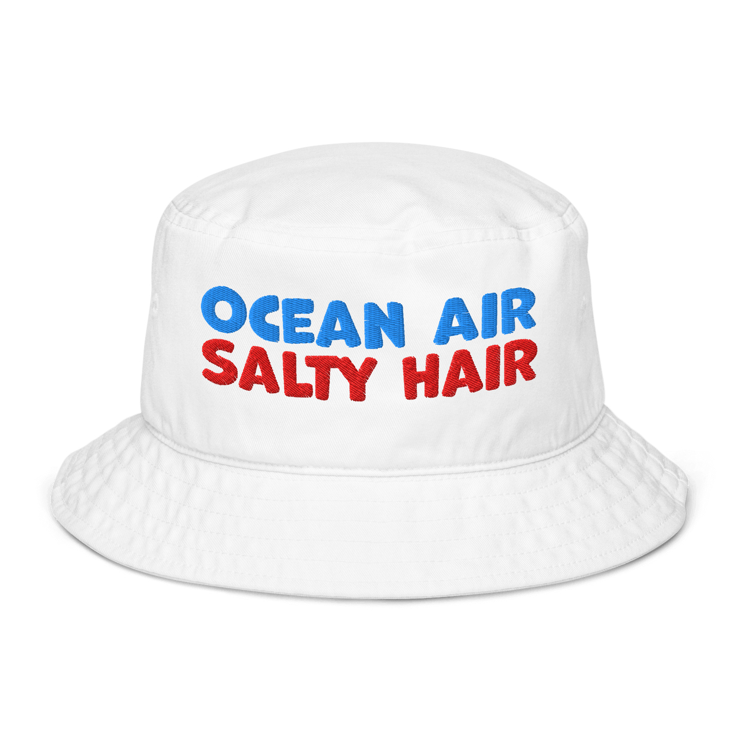White organic cotton bucket hat with bold embroidery that reads “Ocean Air Salty Hair” in blue and red. Eco-friendly, breathable, and biodegradable.