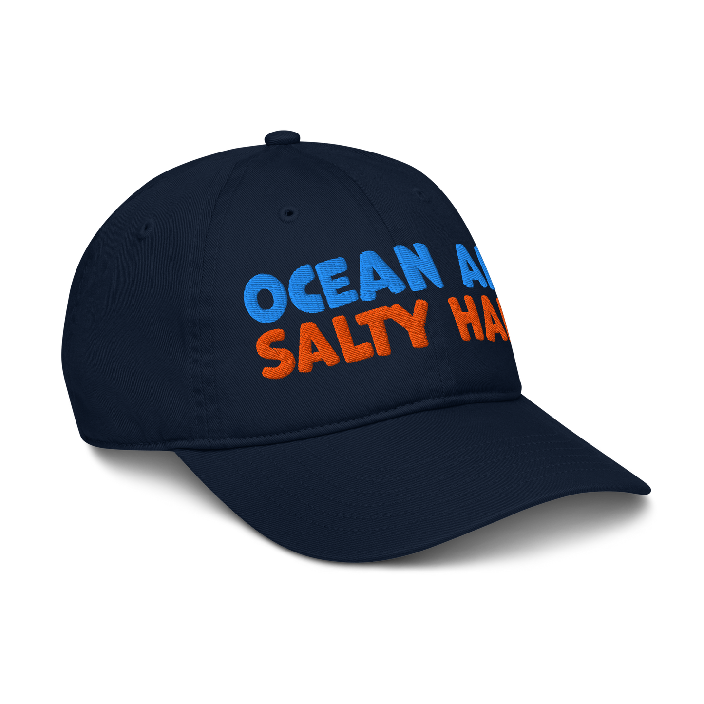 Navy blue cap with 'Ocean Air Salty Hair' text in blue and orange on a white background