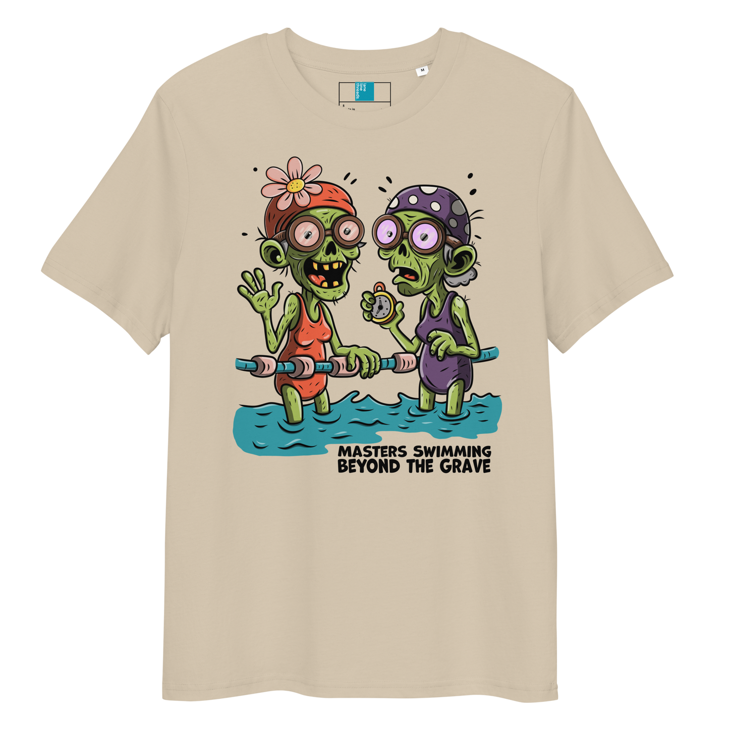 Beige organic cotton funny Halloween swim shirt with cartoon zombie female Masters swimmers holding lane line, text reads ‘Masters Swimming Beyond the Grave