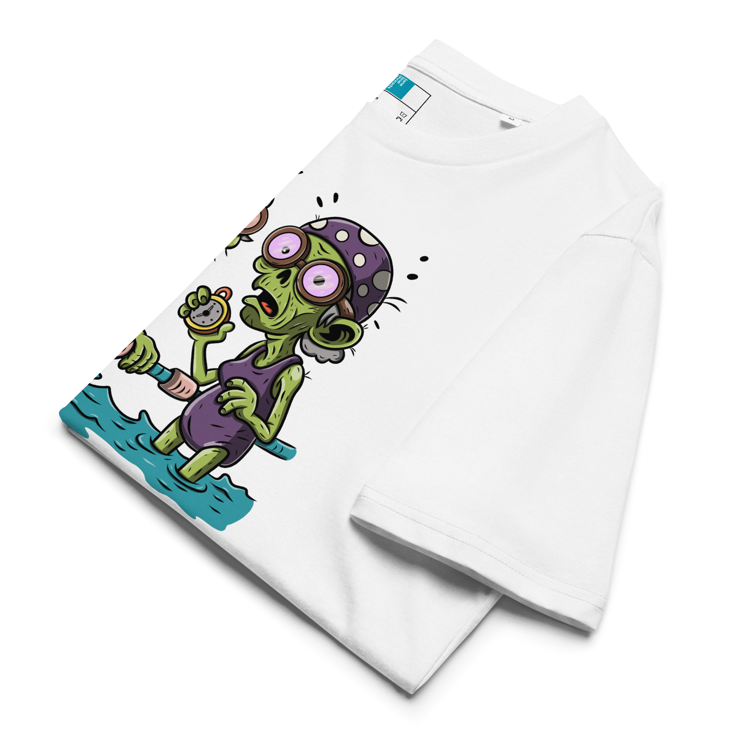 Folded white organic cotton Halloween swim practice shirt with cartoon zombie swim besties holding lane line, text reads ‘still kicking after all these years'