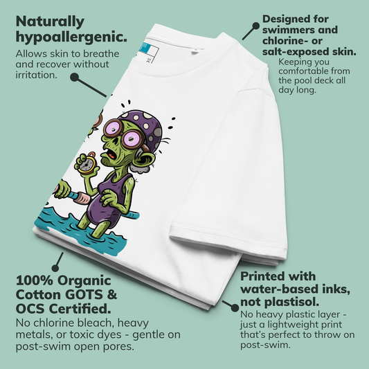 White organic Halloween swim shirt with a cartoon zombie character on a light green background, featuring text about product features.