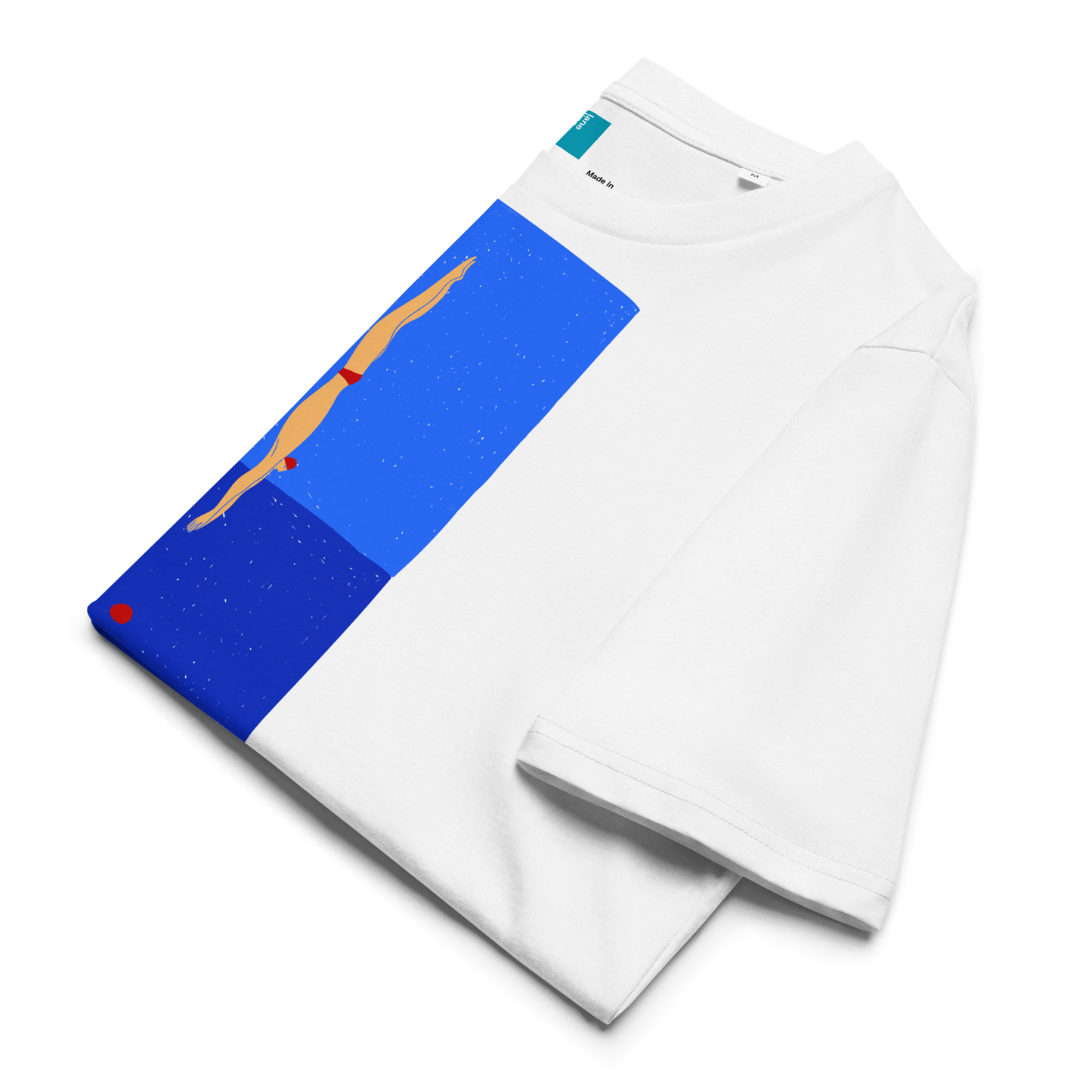 Folded white organic swim shirt featuring a stylized illustration of a swimmer in a red swimsuit performing a perfect dive into dark blue water, with a red dot representing the splash.