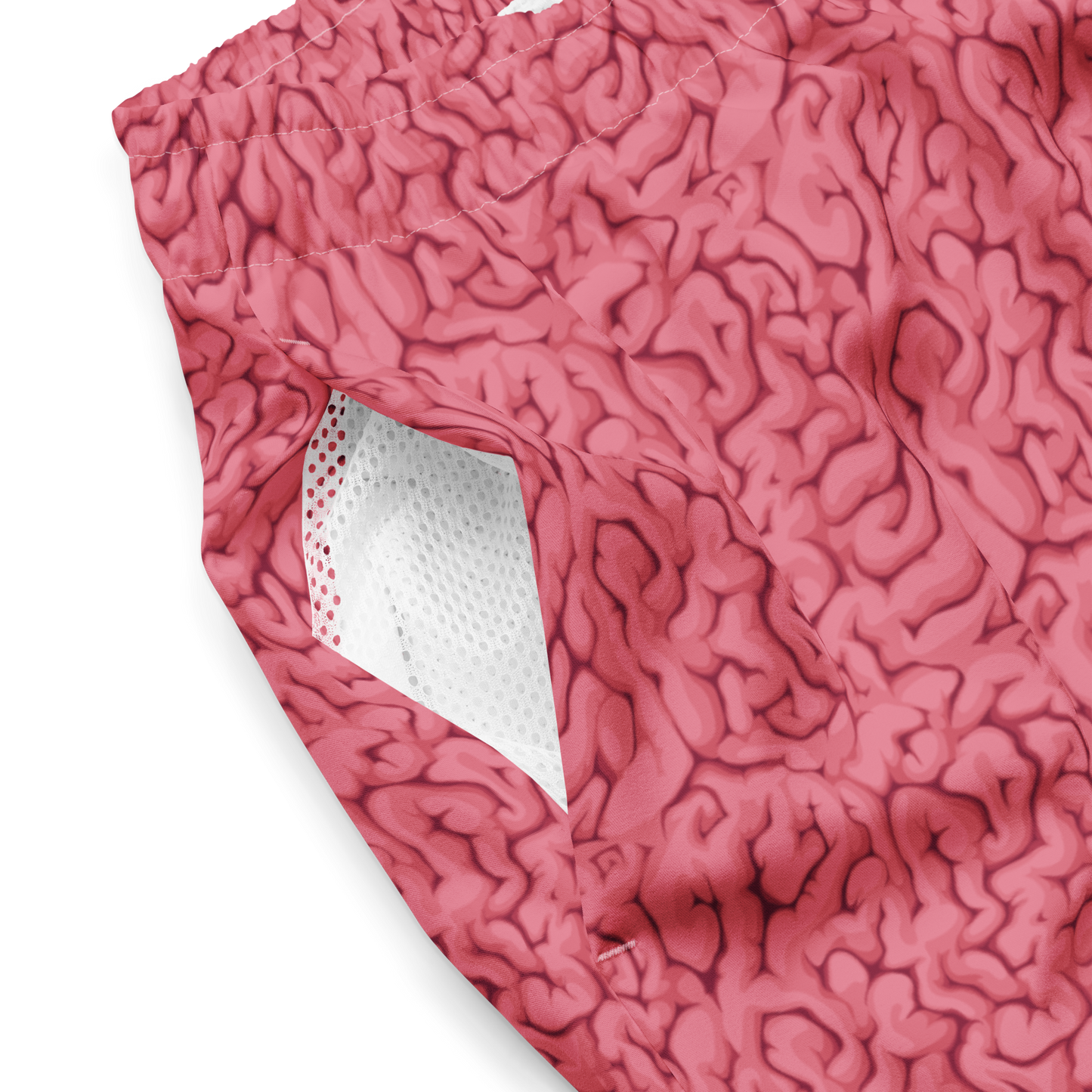 Close-up of Halloween pink brain textured organic swim trunks with a white mesh lining.