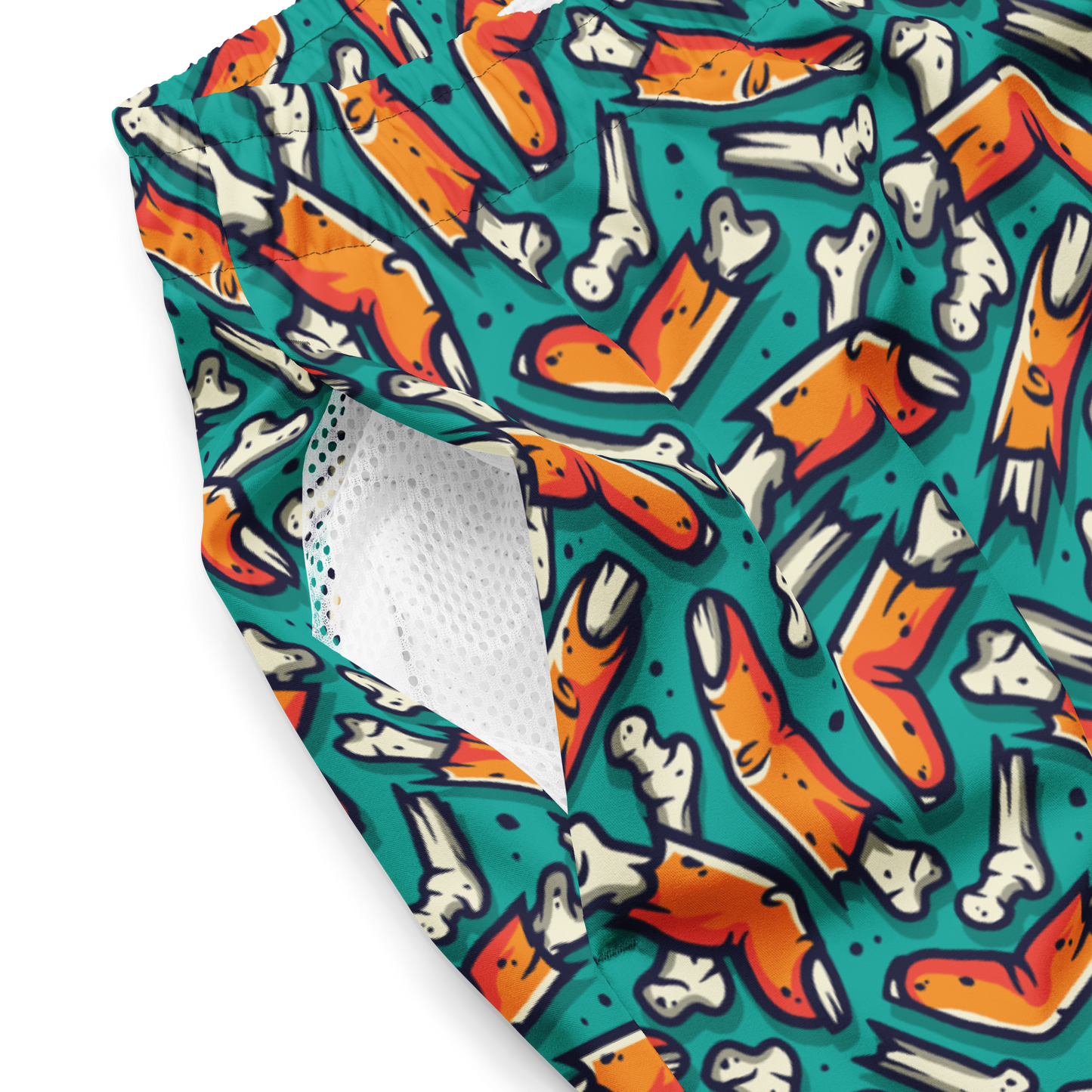 Halloween organic swim trunks with zombie fingers and bones on a teal background
