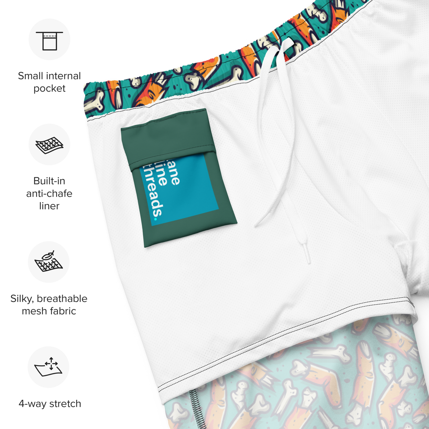 inner side close-up of a Halloween themed organic swim trunks with features highlighted on a white background