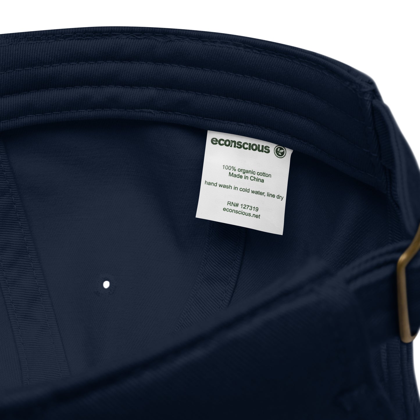 Navy blue garment with an econscious label on a white background