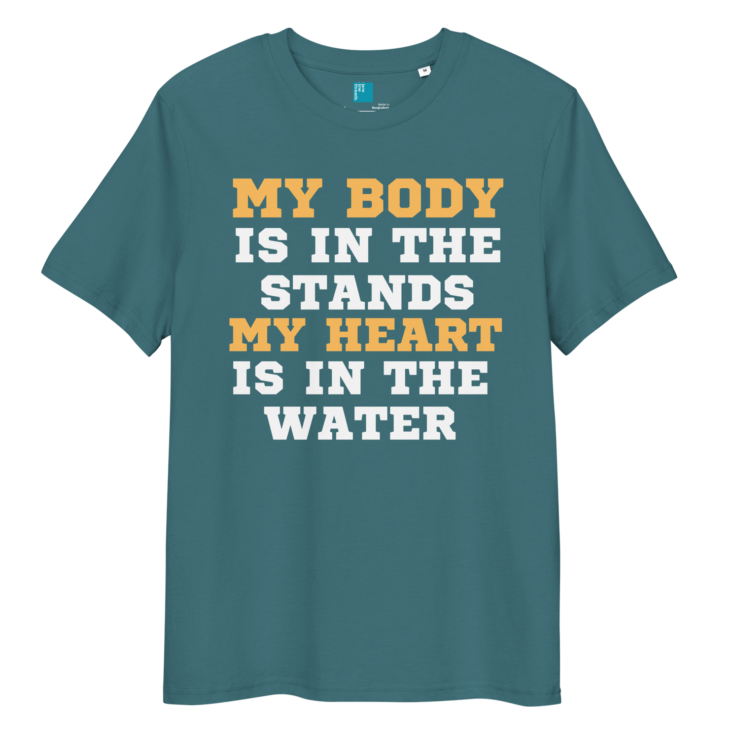 stagazer organic cotton swim mom t-shirt with bold text: “My Body Is in the Stands, My Heart Is in the Water,” displayed on transparent background