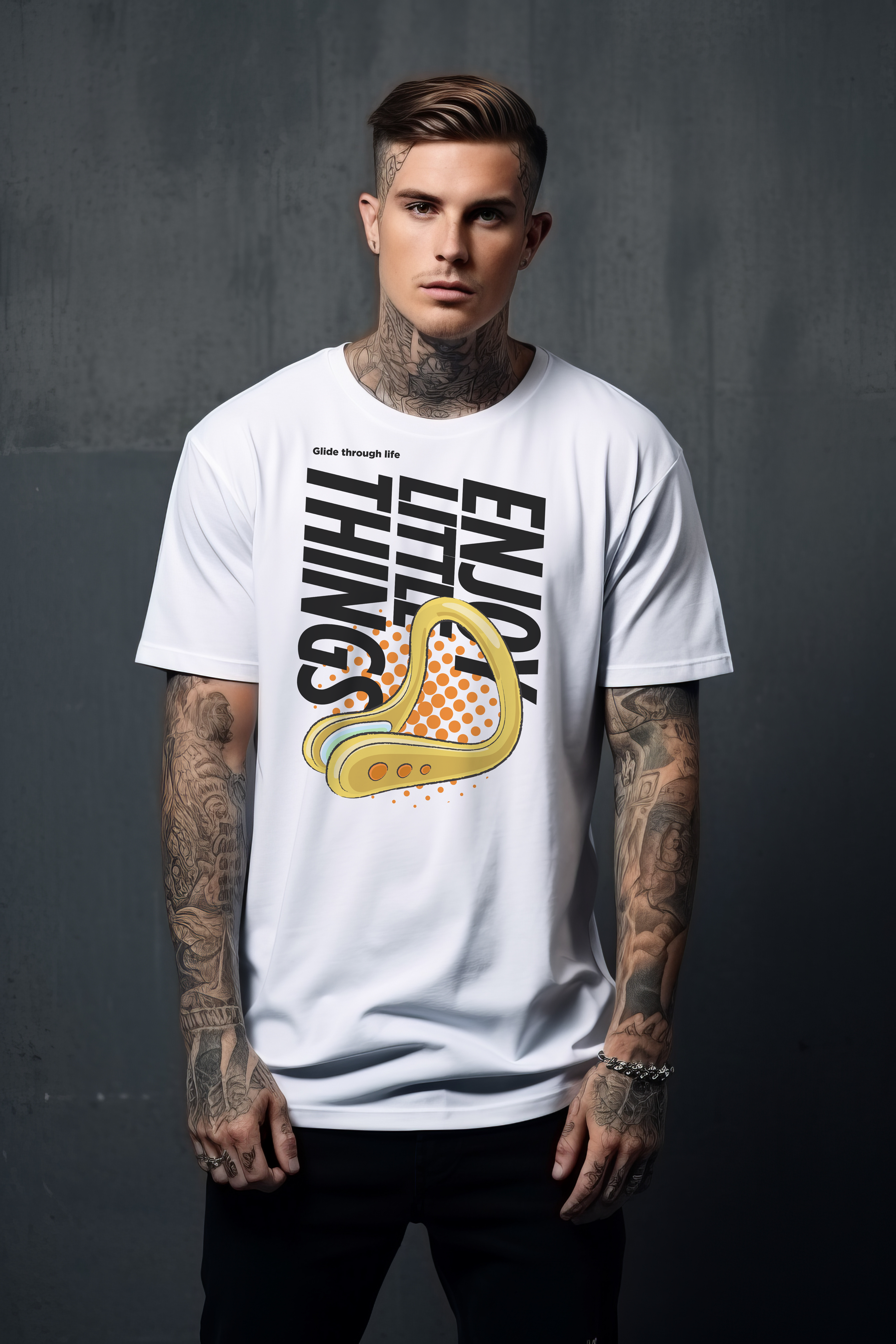Man wearing a white t-shirt with graphic design of a swimming nose clip and enjoy little things text against a dark background