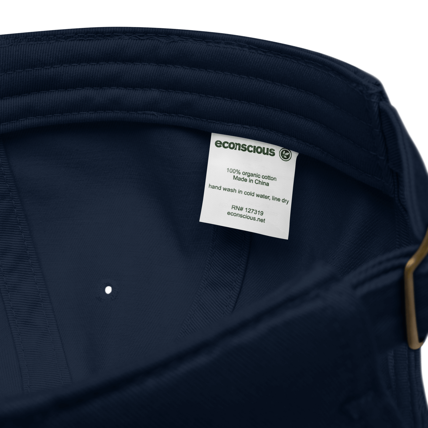 Navy blue garment with an econscious label on a white background