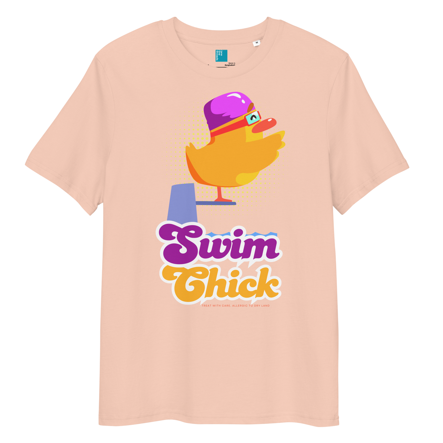 Peach organic funny swim shirt featuring a bright yellow cartoon duck wearing a purple swim cap and goggles, standing on a starting block with the bold retro-style text “Swim Chick.” Made from eco-friendly organic cotton, this breathable and sustainable t-shirt is perfect for competitive swimmers, swim moms, and water-loving athletes who want humor and comfort in and out of the pool.