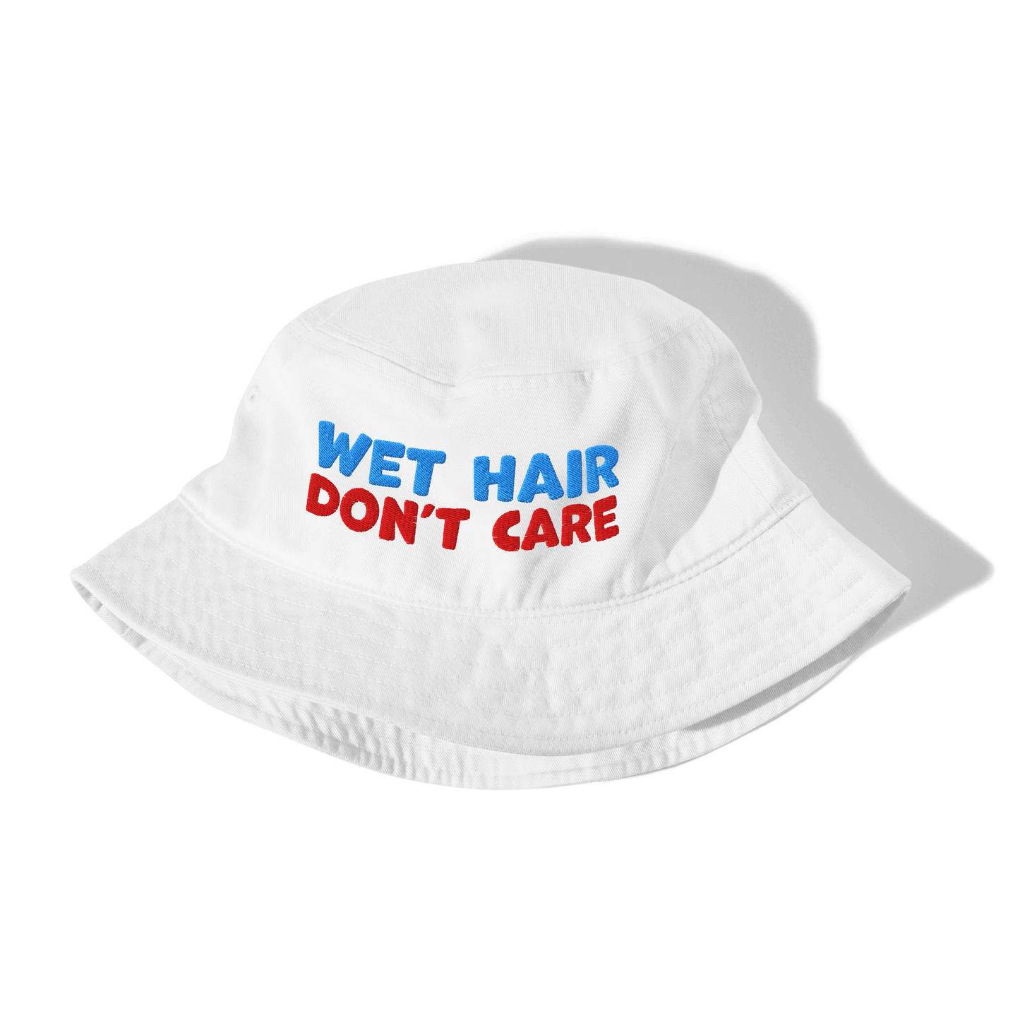 White bucket hat with 'Wet Hair Don't Care' text in blue and red on a white background