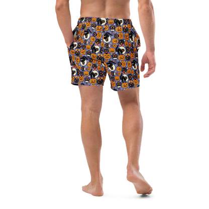 Person wearing Halloween-themed recycled swim trunks on a transparent background