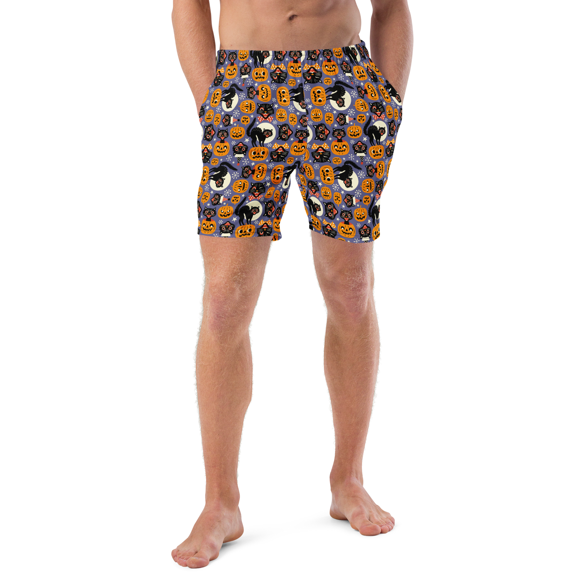 Person wearing Halloween-themed recycled swim trunks on a transparent background