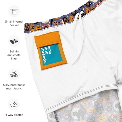 Recycled swim trunks with Halloween-themed waistband and pocket, featuring lane lines threads branding.