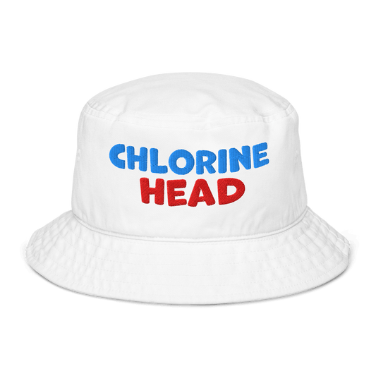 White organic bucket hat with bold red and blue “Chlorine Head” embroidery. Eco-friendly, breathable, biodegradable headwear for swimmers.