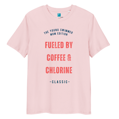 Cotton pink organic cotton swim mom t-shirt with red and navy text: “Fueled by Coffee & Chlorine – The Young Swimmer Mom Edition – Classic.”