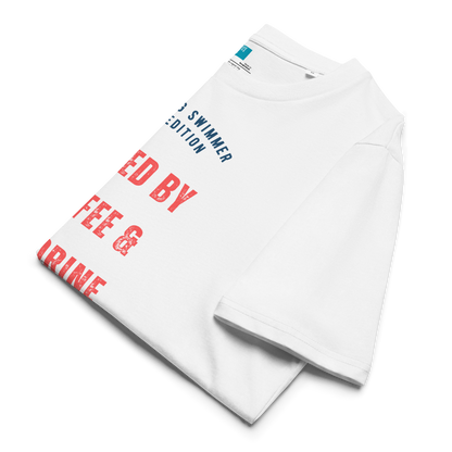 White organic cotton swim mom t-shirt with red and navy text: “Fueled by Coffee & Chlorine – The Young Swimmer Mom Edition – Classic.” folded