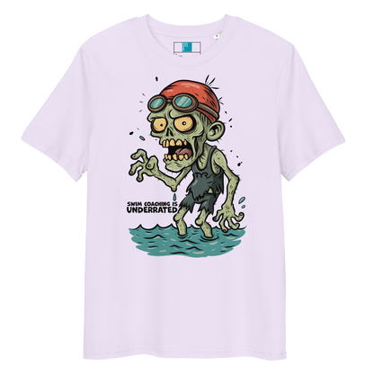 Lavender funny Halloween swimming coach shirt with cartoon zombie coach in red swimming cap and goggles, text reads ‘Swim Coaching is Underrated’