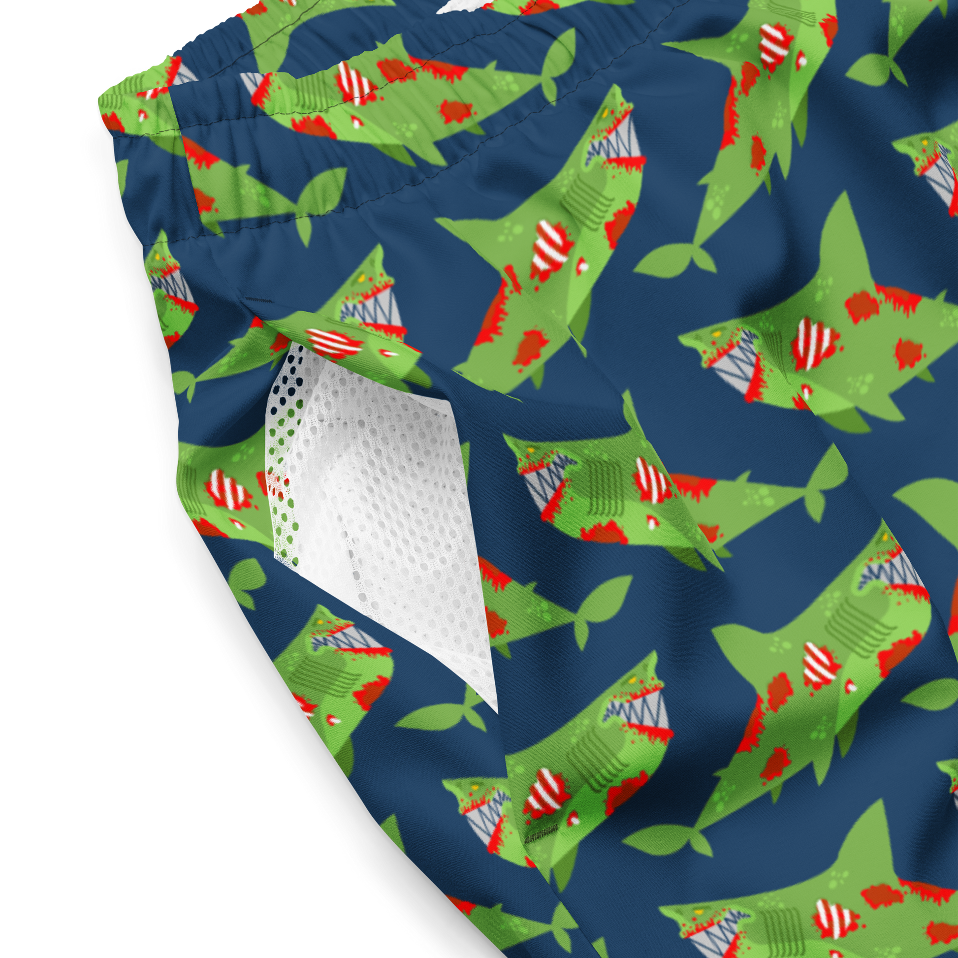 Halloween organic swim trunks with zombie shark pattern on a blue background