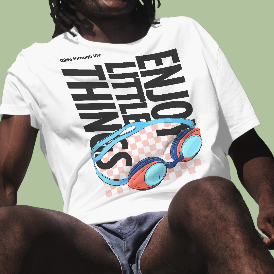 Person wearing a white t-shirt with colorful graphic and text on a green background