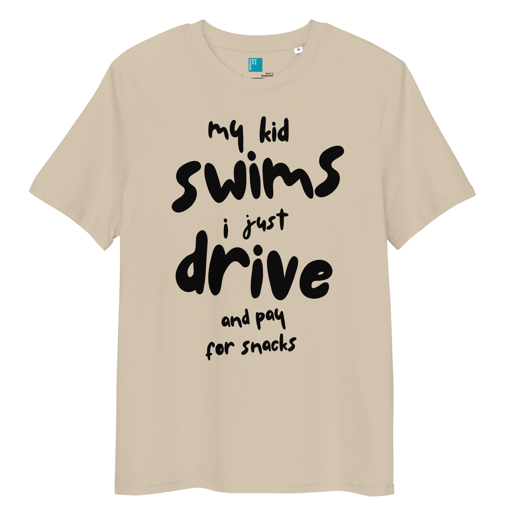 Desert dust organic cotton t-shirt with bold black playful text: “my kid swim, i just drive and pay for snacks,” perfect for swim moms with a sense of humor.