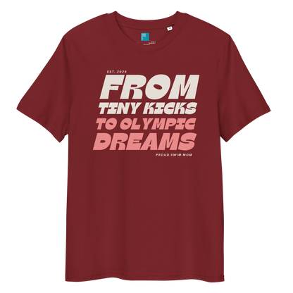 Burgundy organic cotton t-shirt for swim moms with "FROM TINY KICKS TO OLYMPIC DREAMS" and "PROUD SWIM MOM" text, displayed on a transparent background 