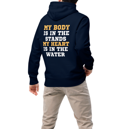 Person wearing a swim parent organic hoodie with bold gold and white varsity text reading "My Body Is In The Stands My Heart Is In The Water" — Lane Line Threads