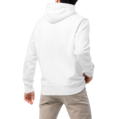 Person wearing a white organic hoodie and beige pants on a white background