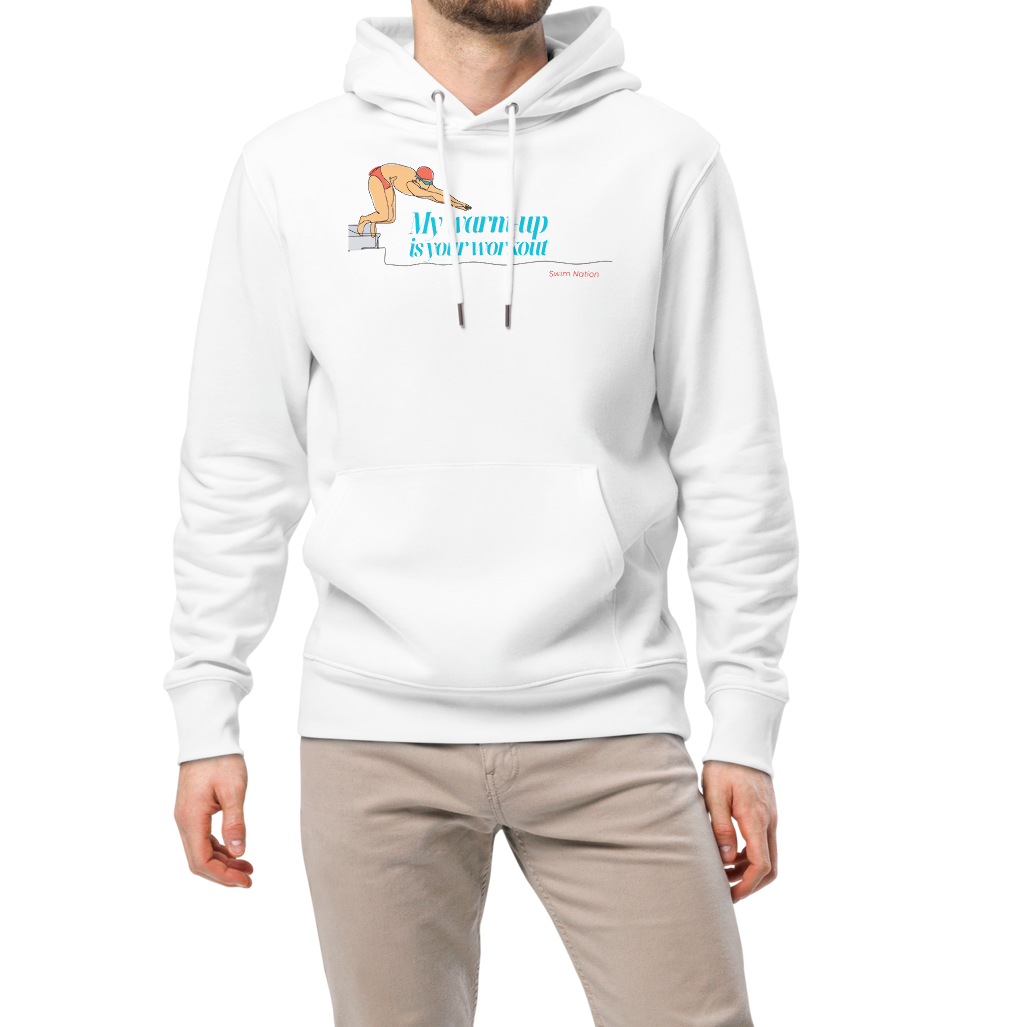 Man wearing a white post swim organic hoodie with a diving block graphic and teal script reading "My Warm-Up Is Your Workout" — Lane Line Threads Swim Nation