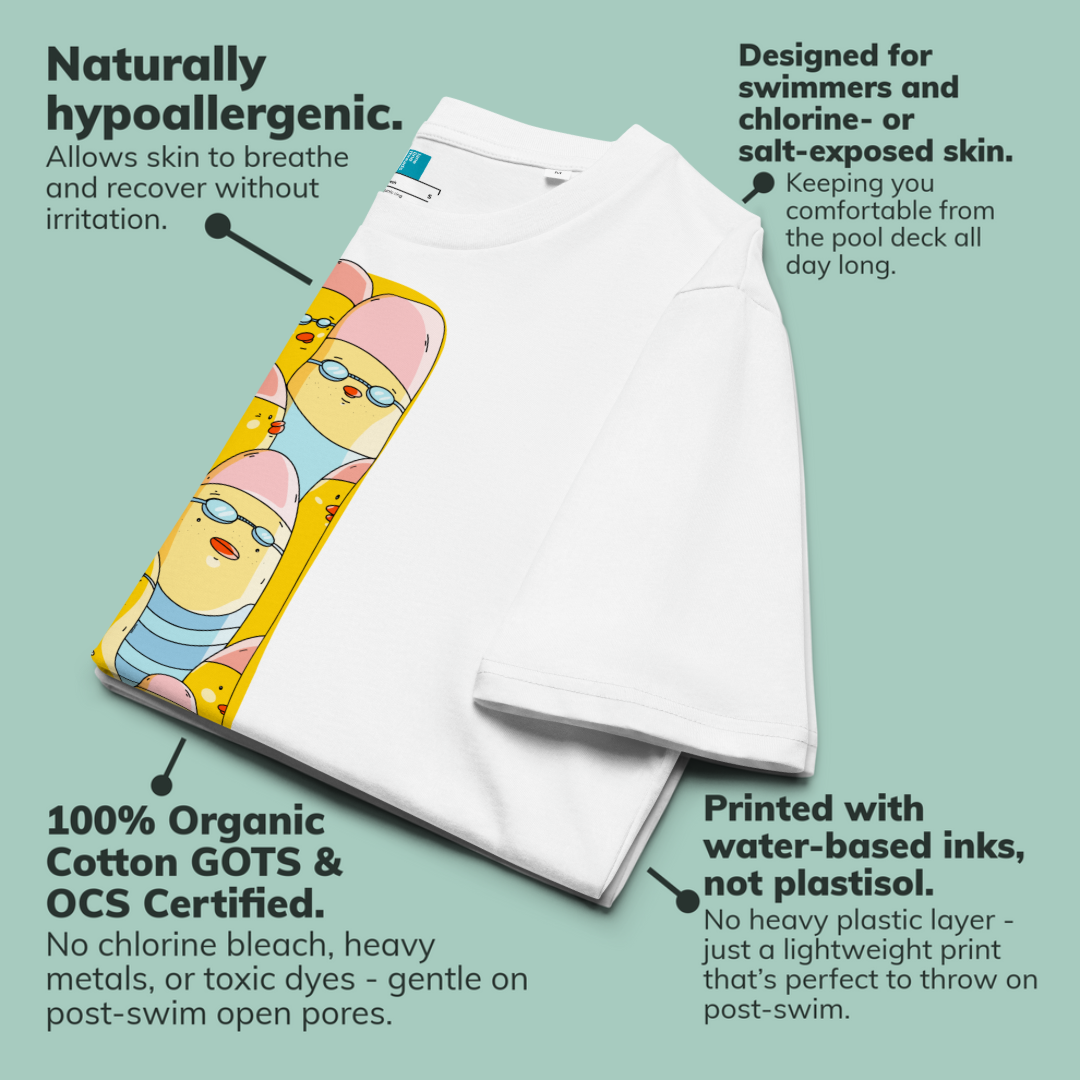 White organic cotton t-shirt with a colorful cartoon duck graphic, surrounded by text callouts highlighting product features like hypoallergenic fabric, chlorine resistance, organic cotton certification, and water-based printing, on a light teal background.