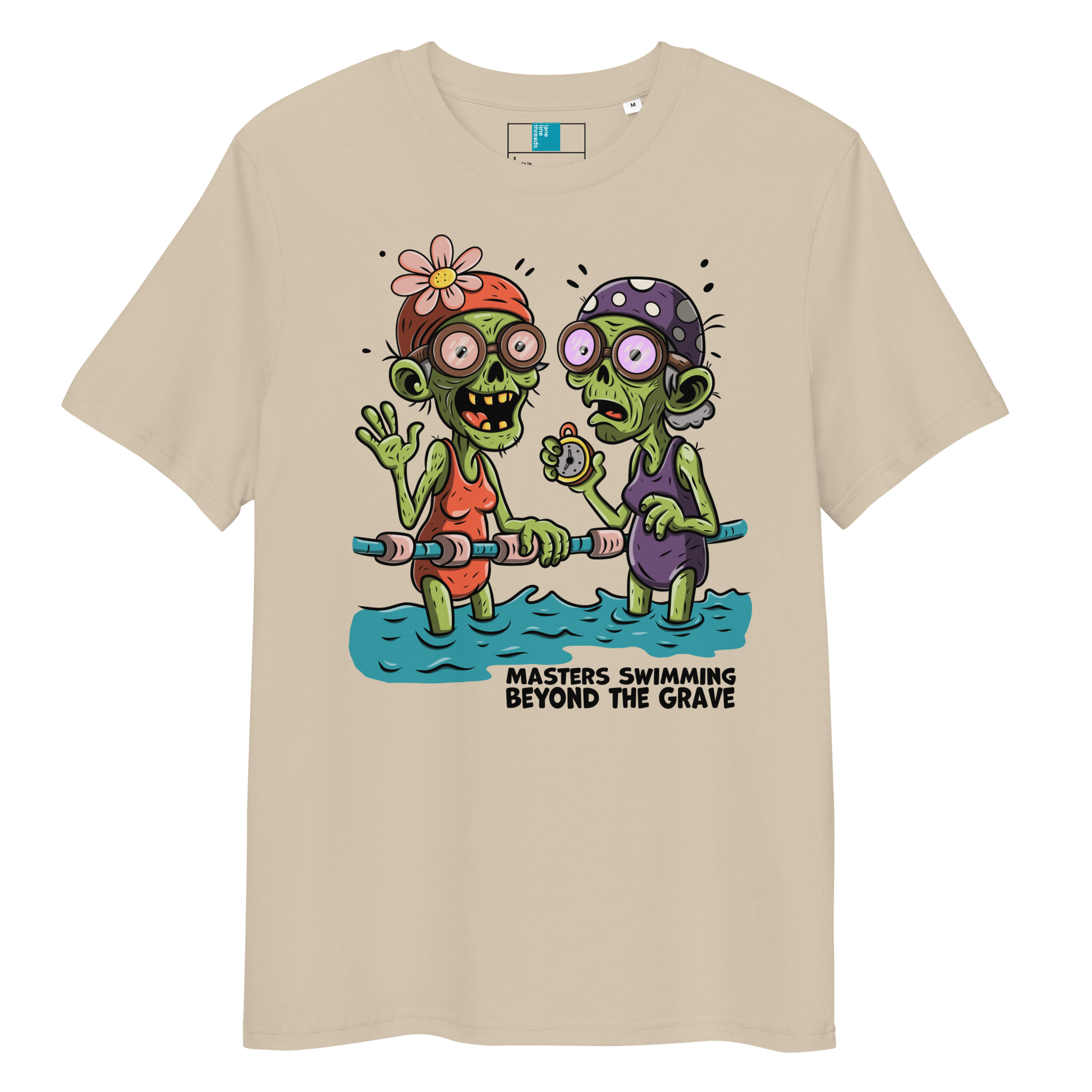 Beige organic cotton funny Halloween swim shirt with cartoon zombie female Masters swimmers holding lane line, text reads ‘Masters Swimming Beyond the Grave