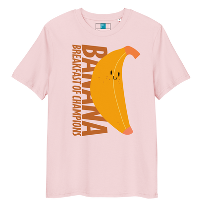 Pink organic funny swim shirt with a cute smiling banana and the text ‘Banana Breakfast of Champions’ – eco-friendly, soft, and gentle for post-swim skin.