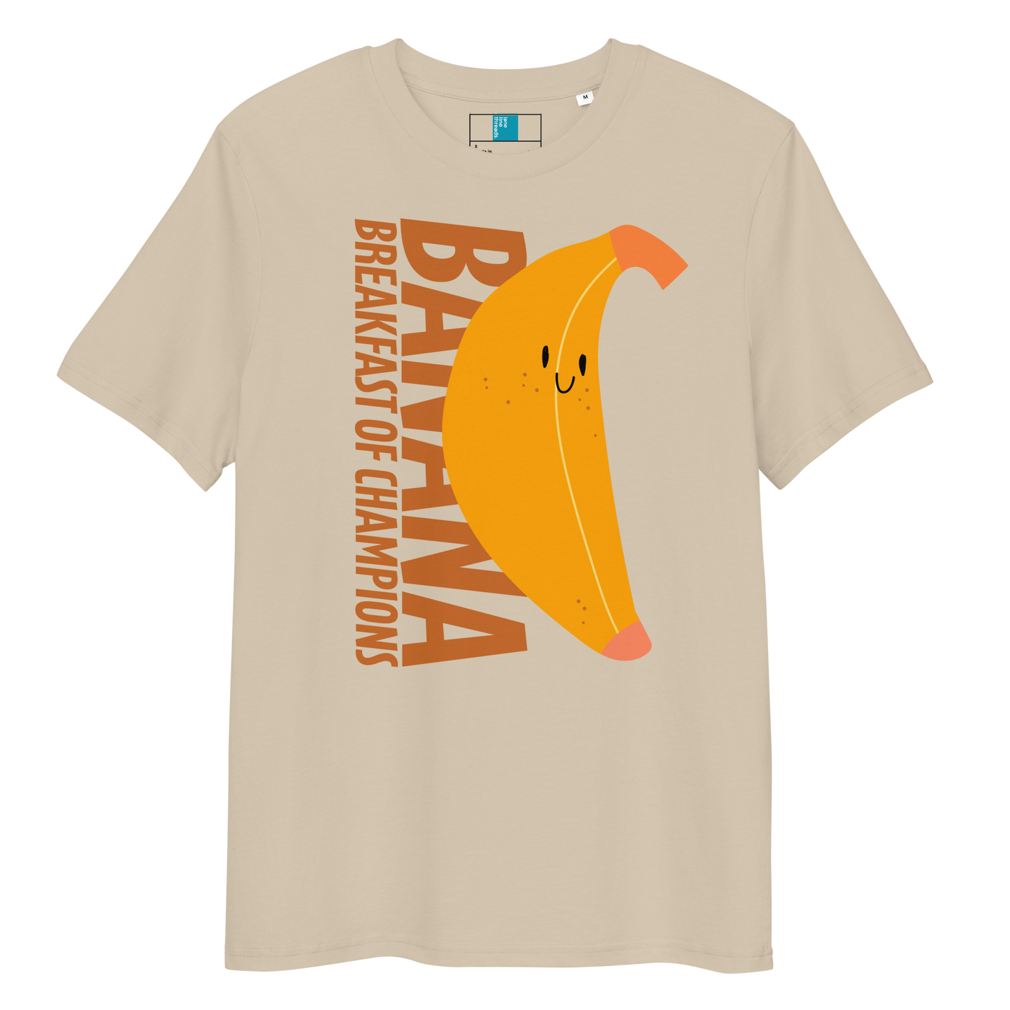 Beige organic funny swim shirt with a cute smiling banana and the text ‘Banana Breakfast of Champions’ – eco-friendly, soft, and gentle for post-swim skin.