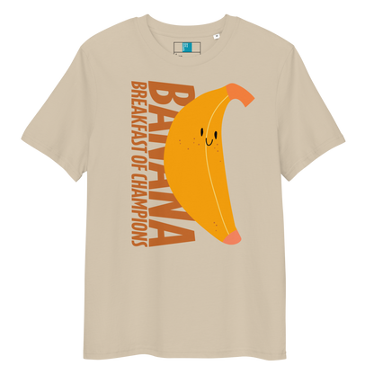 Beige organic funny swim shirt with a cute smiling banana and the text ‘Banana Breakfast of Champions’ – eco-friendly, soft, and gentle for post-swim skin.