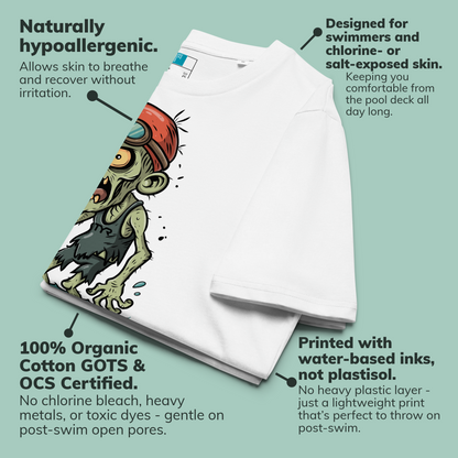 White organic swim shirt with cartoon zombie swimmer character on a light green background, featuring text about product benefits.