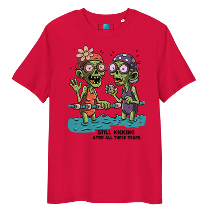 Red organic cotton Halloween swim practice shirt with cartoon zombie swim besties holding lane line, text reads ‘still kicking after all these years'