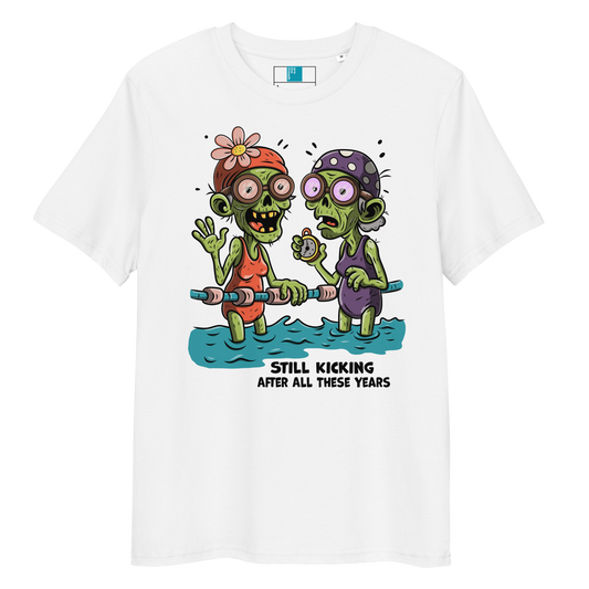 White organic cotton Halloween swim practice shirt with cartoon zombie swim besties holding lane line, text reads ‘still kicking after all these years'