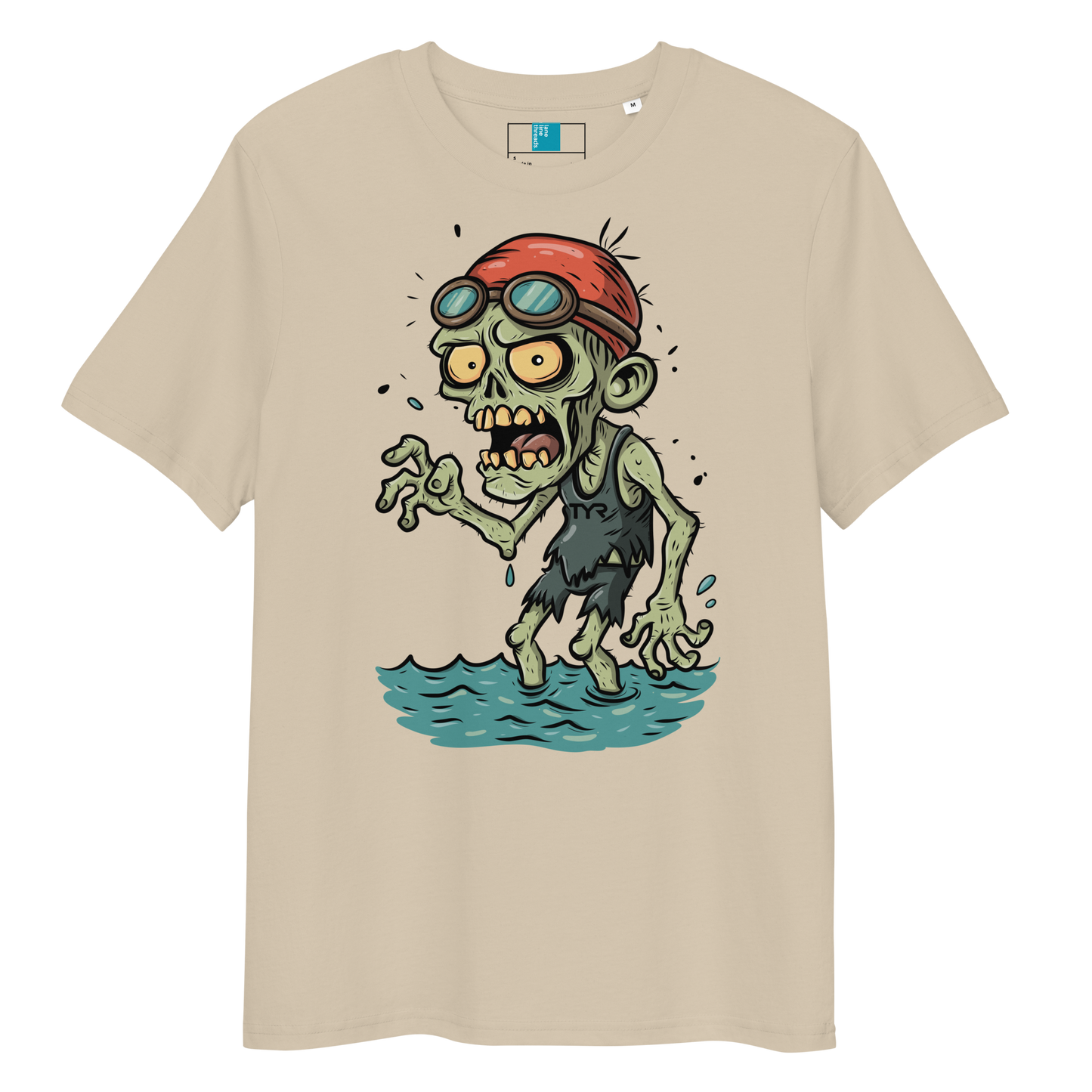Cartoon zombie swimmer in red cap and blue goggles emerging from water, printed on beige organic cotton Halloween swim shirt by Lane Line Threads