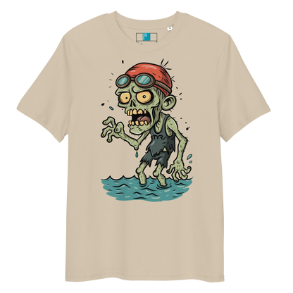 Cartoon zombie swimmer in red cap and blue goggles emerging from water, printed on beige organic cotton Halloween swim shirt by Lane Line Threads