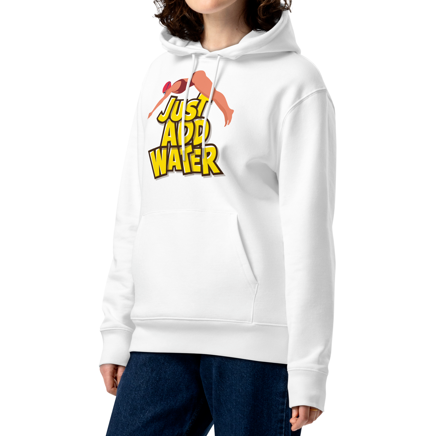 A woman with curly brown hair wearing an organic hoodie in white by Lane Line Threads with a “Just Add Water” swim graphic and female swimmer illustration, made from GOTS and OCS certified organic cotton.